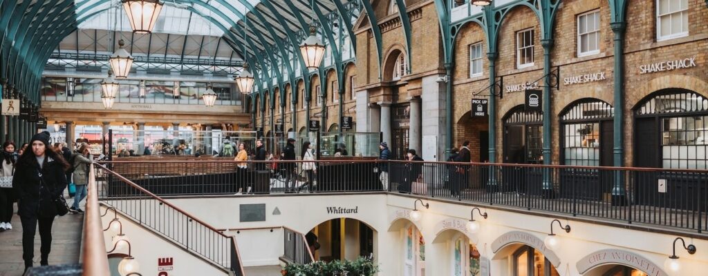 Victorian iron and glass market hall interior at Covent Garden, London